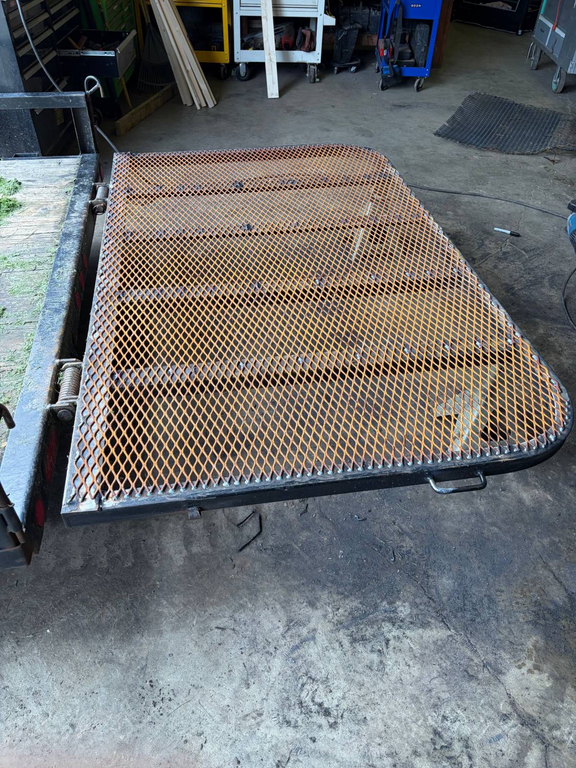 Trailer gate after repair with replacement expanded metal mesh welded in